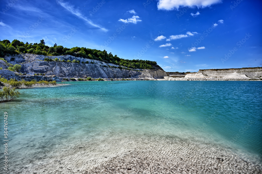 beach with green water