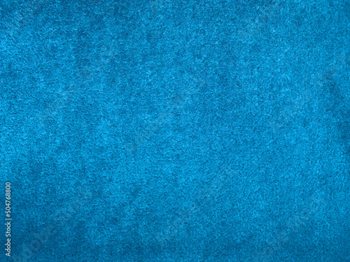 Light blue velvet fabric texture used as background. Empty light blue fabric background of soft and smooth textile material. There is space for text.
