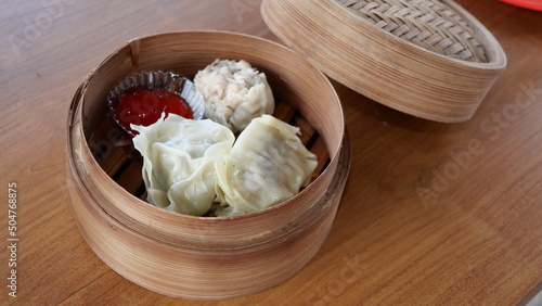 dimsum served on a bamboo tray makes it even more delicious to eat