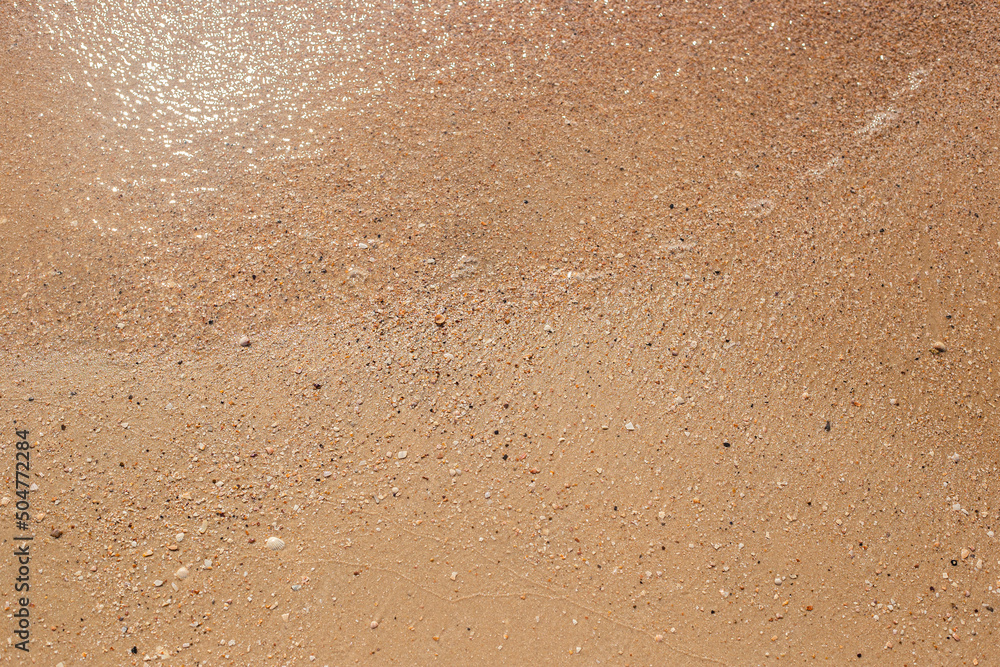Summer day beach sand texture. Top view, flat lay