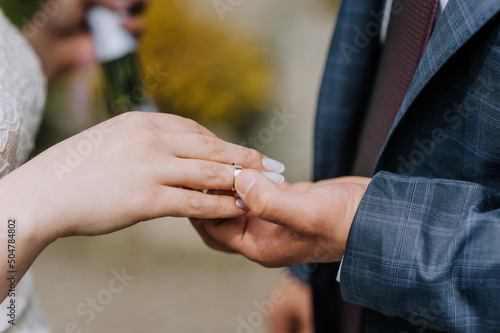 Hands of the bride and groom close-up at the wedding ceremony. wedding photography.