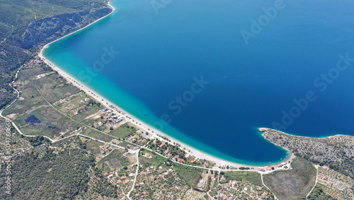 Aerial photo of famous sandy beach of Psatha in West Attica with emerald clear sea, Corinthian gulf, Greece photo