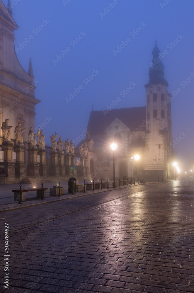 Krakow old town,  St Andrew church on Grodzka street in the foggy night