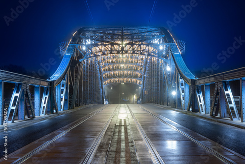 Krakow Poland  Pilsudski bridge over Vistula river in the night.