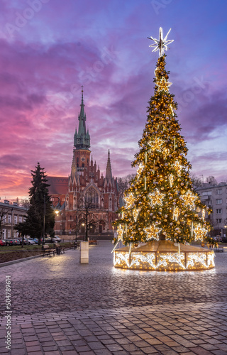 Krakow, Poland, Christmas tree on Podgorze Square and St Joseph church photo