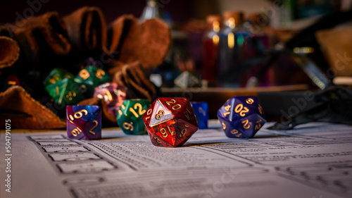 Red d20 on a character sheet photo