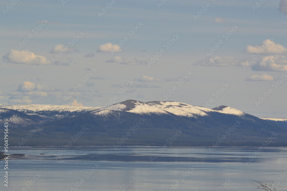 snow covered mountains and sea