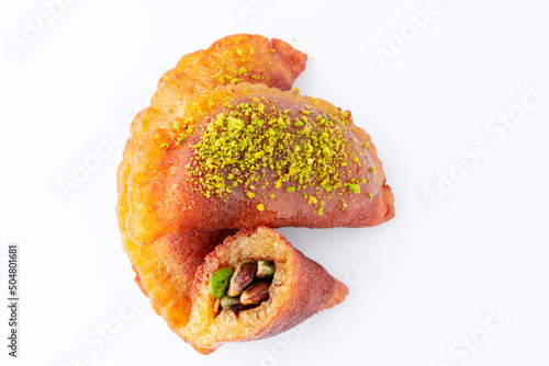 Turkish dessert tas kadayif with pistachio	 photo