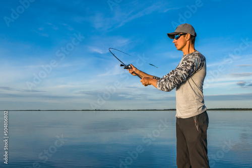 Fototapet Fishing casting