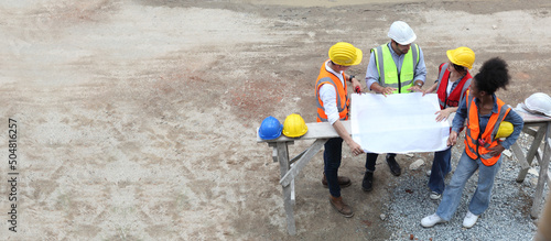 Obraz na płótnie engineering or worker meeting discuss at construction site ,top view and copy space w salonie