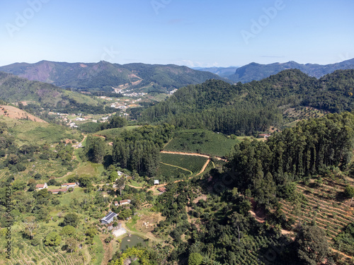beautiful green valley with coffee, eucalyptus and banana plantation, drone aerial view - Venda Nova, Espirito Santo, Brazil photo