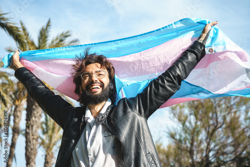 Wallpaper Mural Pride trans person with transgender flag Torontodigital.ca