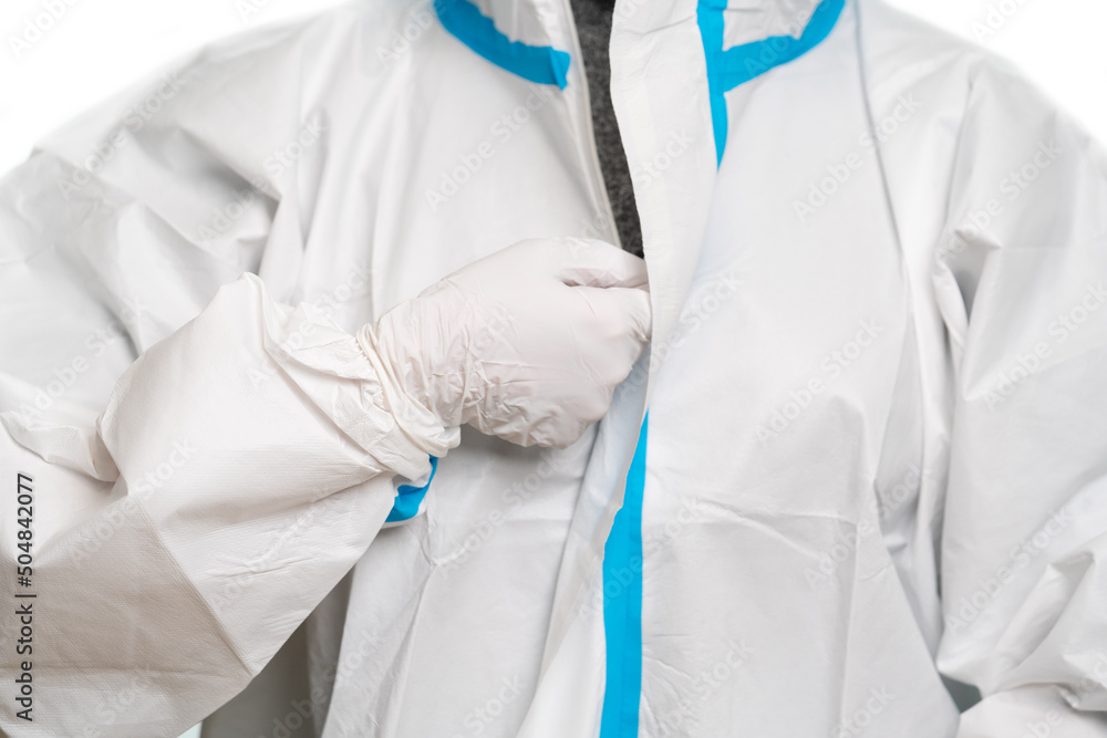 Doctor or nurse is wearing protective suit Doctor or nurse is wearing protective suit