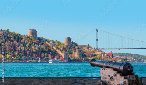 Rumeli Hisari (fortress) in to Bosphorus Sea and  bridge with cannon - Istanbul, Turkey photo