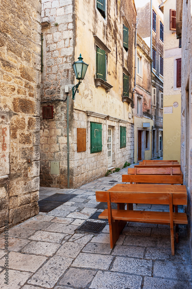An outdoor cafe on the narrow streets of the Mediterranean riviera. Split, Dalmatia, Croatia