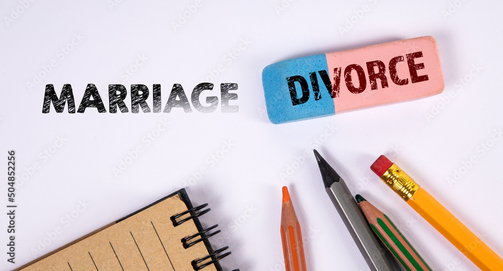 Marriage and Divorce concept. Eraser and pencils on a white background Marriage and Divorce concept. Eraser and pencils on a white background