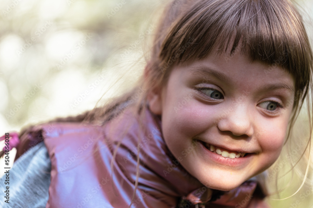 Portrait of smiling cute little girl close-up outdoors. Portrait of smiling cute little girl close-up outdoors.