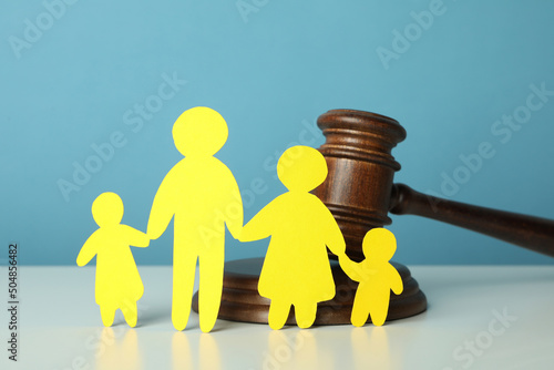 Фотография Family law concept on white table against blue background