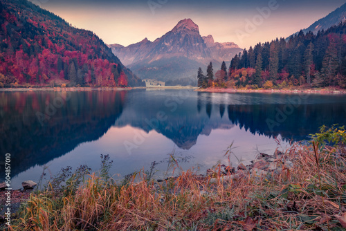 Calm autumn view of Obersee lake, Nafels village location. Fabulous morning scene of Swiss Alps, canton of Glarus in Switzerland, Europe. Beauty of nature concept background.