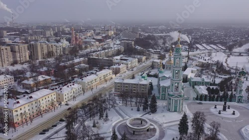 Winter view from a drone of the Spaso-Preobrazhensky Cathedral in the city center and residential areas in Tambov, Russia. photo