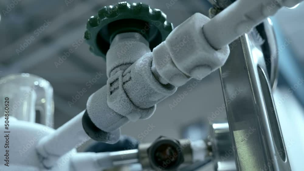 Compressed gas pressure gauges on pipelines covered with frost due to