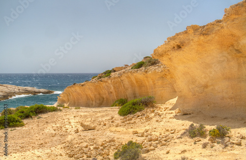 Uplifted wavecut notch on Crete, Greece, shows that the land has been lifted up or the sea level has fallen photo