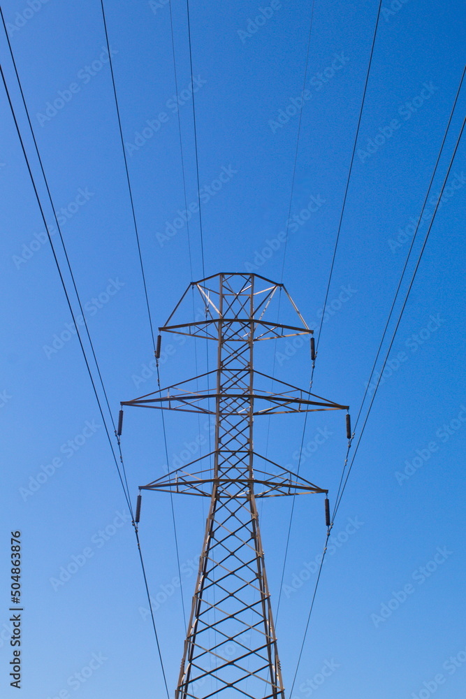Metallic towers with cables that carry electricity to supply businesses and homes
Metallic towers with cables that carry electricity to supply businesses and homes