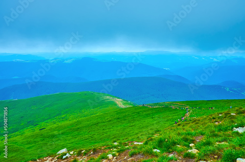 The mountain scenery with green Mount Hoverlyana, Carpathians, Ukraine photo