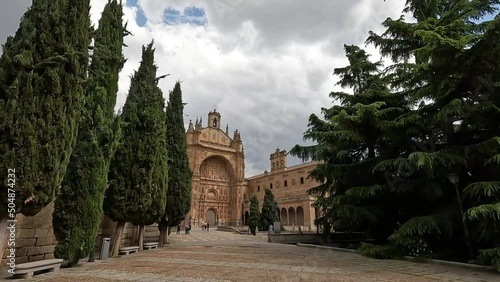 Paseando por la plaza del concilio de Trento con el convento de san Esteban al fondo en Salamanca, España photo