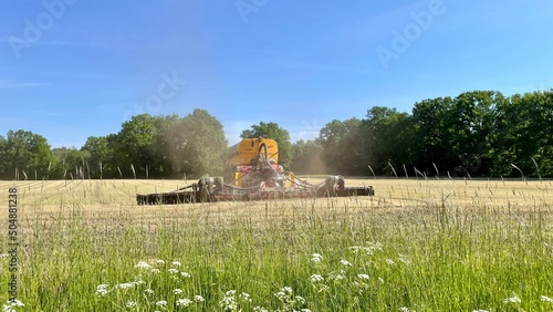 Old combine harvester in the field