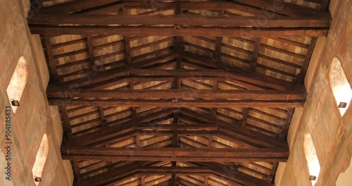 Low angle shot of the wooden ceiling of Paleochristian church of Santa Maria in Cosmedin, at the foot of the Aventine hills in Rome, Italy photo