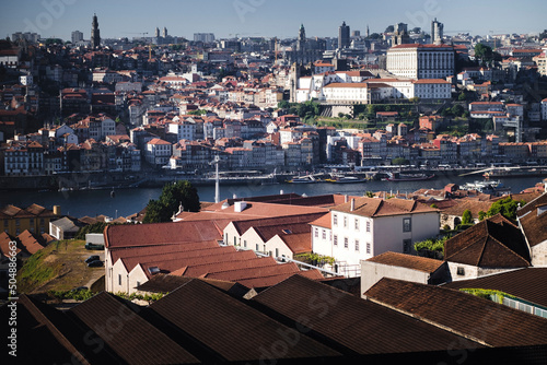 View of the Douro River and Porto's Ribeiro from the rooftops of port wine cellars in Vila Nova de Gaia, Portugal. photo