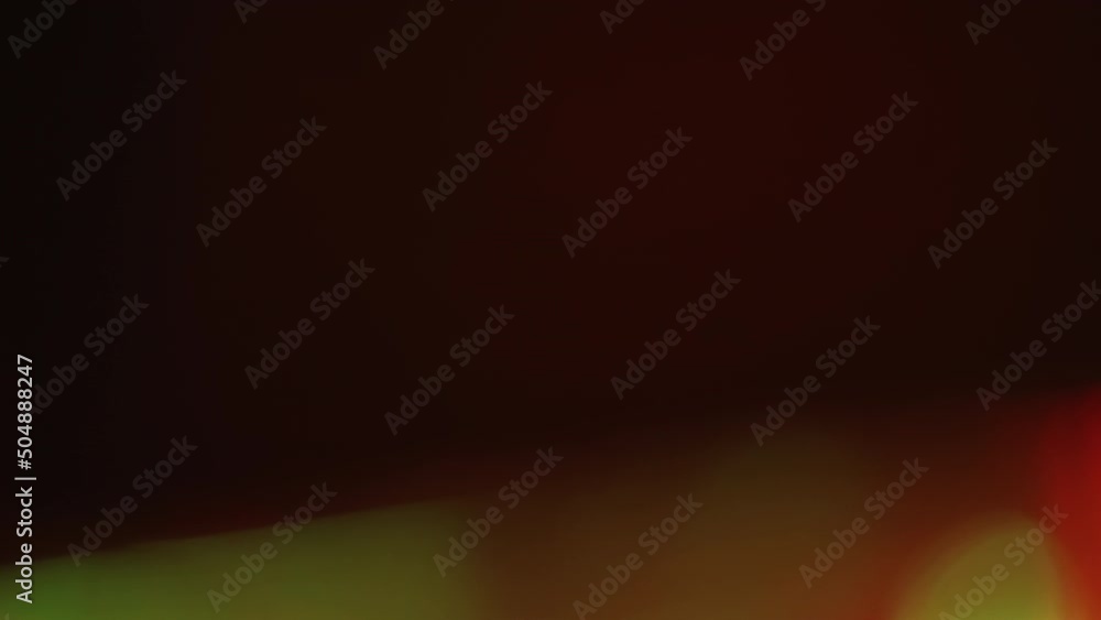 Blur light overlay. Color lens flare. Gleam bokeh rays leak. Defocused neon red orange green shiny flash spot on dark black abstract layer. Blur light overlay. Color lens flare. Gleam bokeh rays leak. Defocused neon red orange green shiny flash spot on dark black abstract layer.