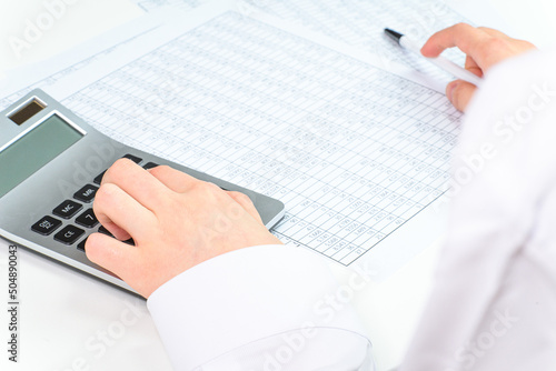 A person who is looking at financial statements in a company