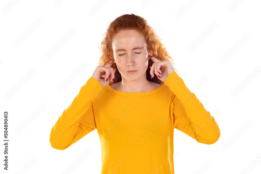 Young redhead woman over white grunge wall covering ears with fingers with annoyed expression for the noise of loud music Young redhead woman over white grunge wall covering ears with fingers with annoyed expression for the noise of loud music