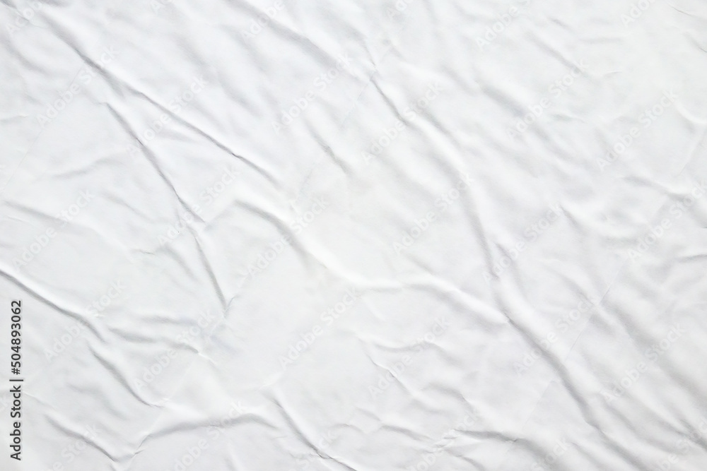 Obraz premium white crumpled and creased paper poster texture background