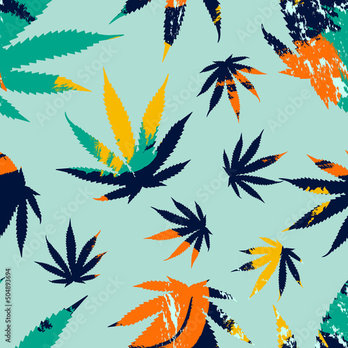 Cannabis leaves seamless pattern on blue background.