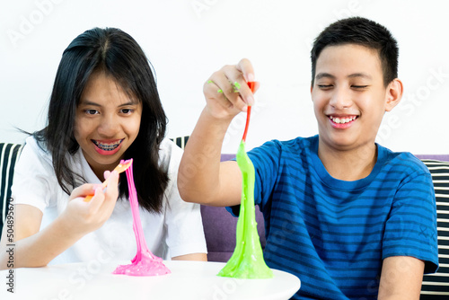 Homemade Toy Called Slime, Kids having fun and being creative by science experiment