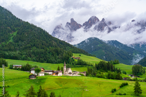 Evening view the famous Church of St. Magdalena with Odle Peaks of the Italian Dolomites Mountain in Province of Bolzano, South Tyrol, Italy.