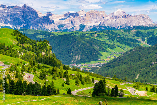 Aerial view of Val Gardena or Gardena Valley at Gardena Pass, the high mountain pass in Dolomites of South Tyrol, Italy.