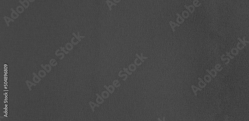 Textured of dark gray or grey sofa surface for background or wallpaper. Soft material and Pattern concept 