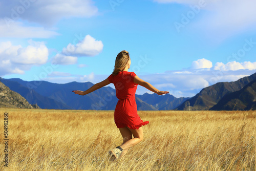 mountains travel field girl, freedom and happiness concept active