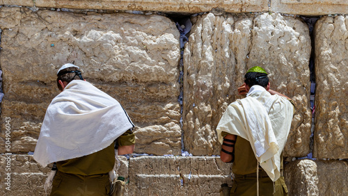Jewish soldiers pray at the Western Wall in Jerusalem(Israel)