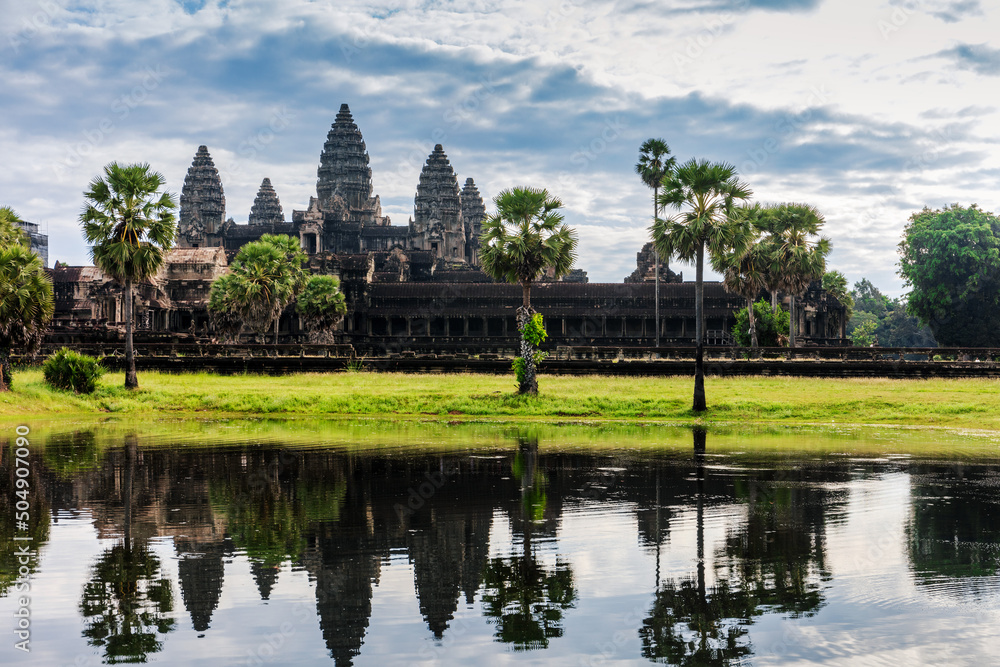 Angkor Wat and its reflection in the lake Angkor Wat and its reflection in the lake