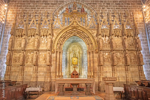 VALENCIA, SPAIN - FEBRUARY 14, 2022: The alabaster altar of  Holy Chalice chapel the the Cathedral by more sculptors (1441 - 1446). photo