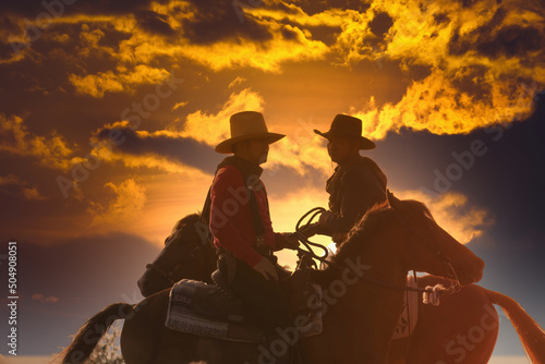 Group of Cowboy riding horse.