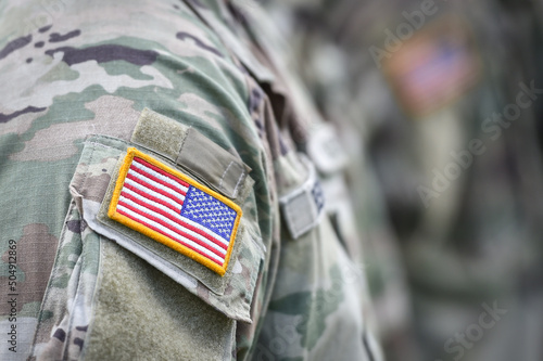 Detail shot with american flag on soldier uniform standing in military position during ceremony