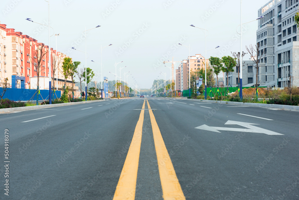 City streets, asphalt roads, traffic signs, traffic lights City streets, asphalt roads, traffic signs, traffic lights