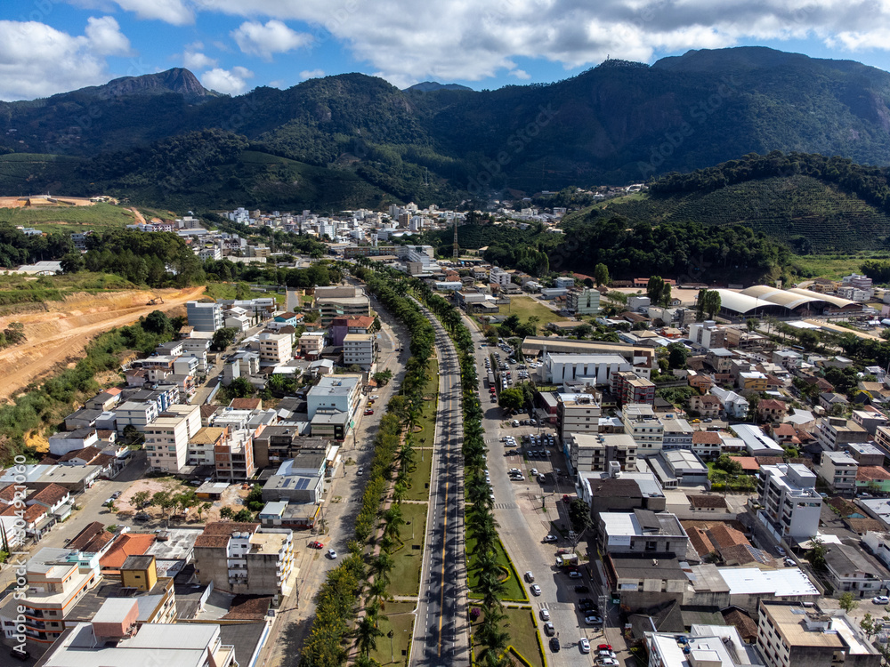 Beautiful highway in a small and organized country town with lots of vegetation, aerial drone view, Venda Nova do Imigrante, Espirito Santo, Brazil