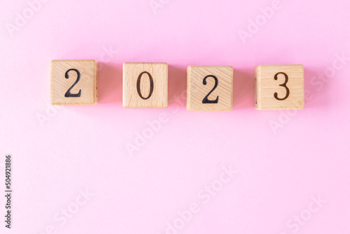 New year 2023 on wooden cubes. Wooden cube with 2022 to 2023 year. Start new year 2023 with goal plan, goal concept, action plan, strategy, new year business vision.